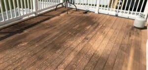 Deck in need of pressure washing by Extra Mile Powerwashing in Inwood, WV